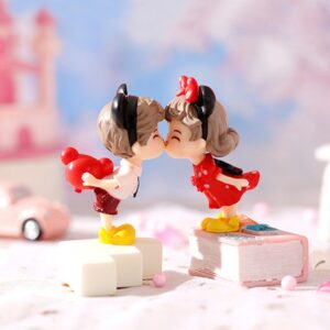 Kissing couple dressed as Mickey