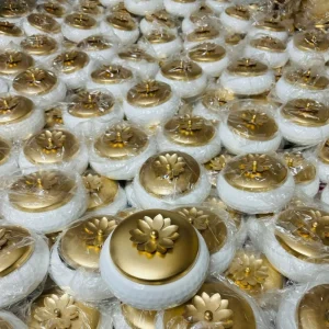 White Metal Powder Coated Container with Golden Flower Lid White Metal Powder Coated Container with Golden Flower Lid