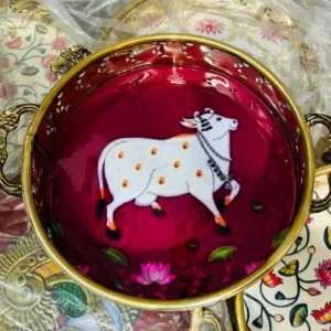 Maroon Round Pichwai Brass Tray with Cow Design Maroon Round Pichwai Brass Tray with Cow Design